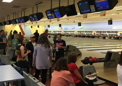 people at a bowling alley